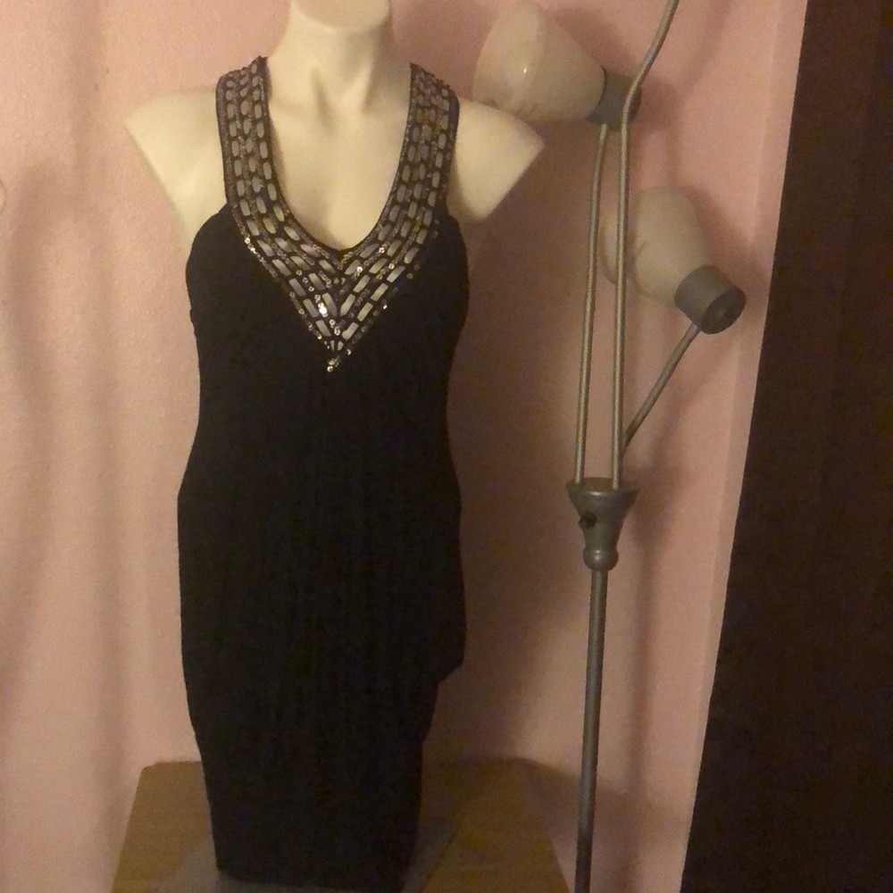 Black mini dress sleeveless sling back